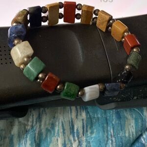 Multi gem stone  stretch bracelet with silver balls spacers  appears to be SS